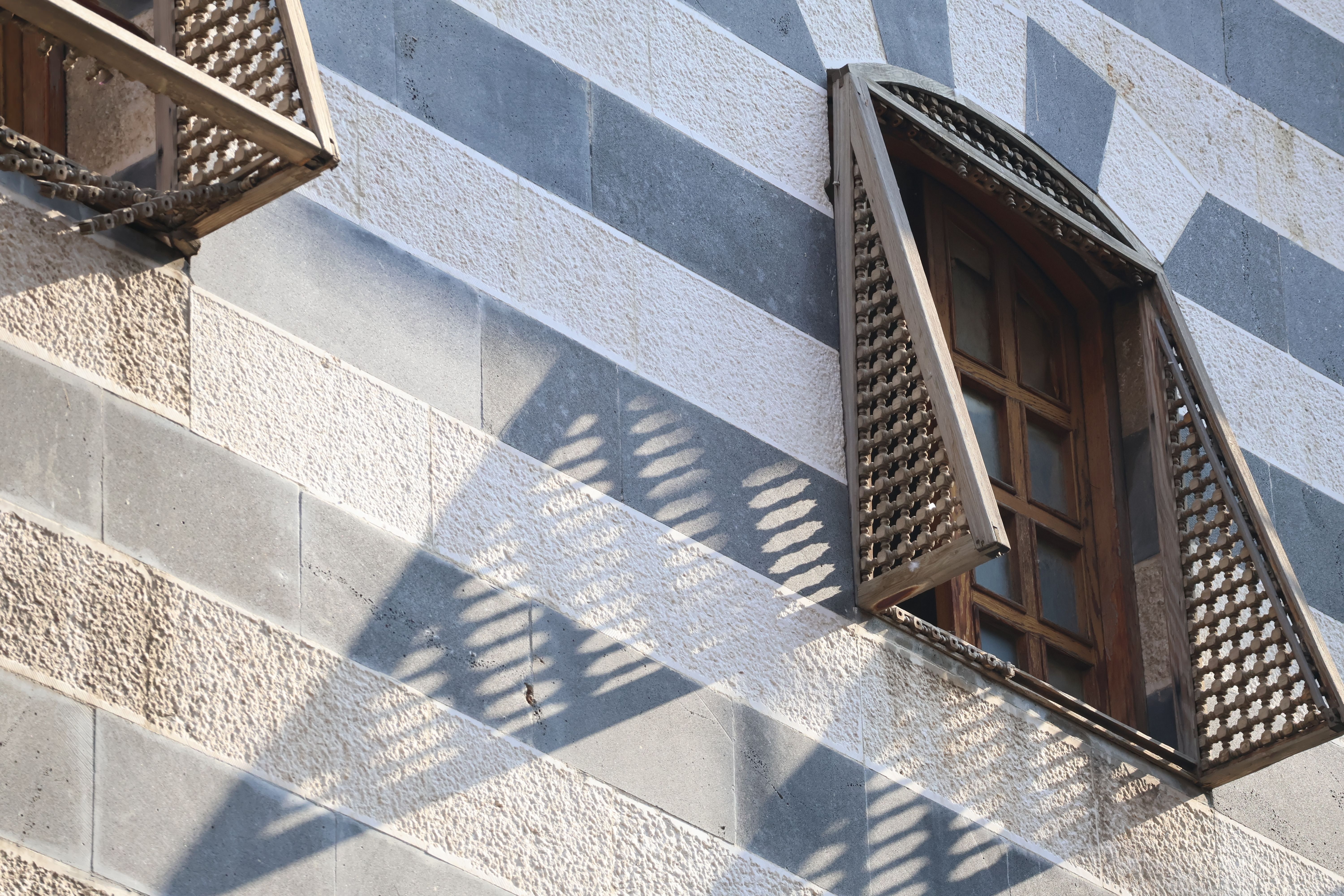 Traditional Arabic mashrabiya geometric pattern panel at Einsign Group UAE